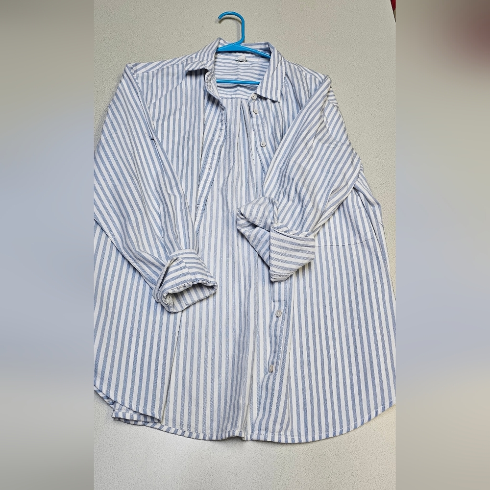 Womens long sleeve blue and white shirt.